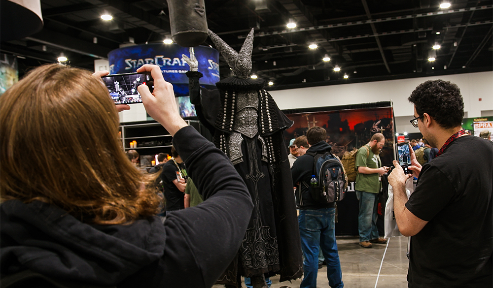 People admiring the Artillery Witch at Adepticon.