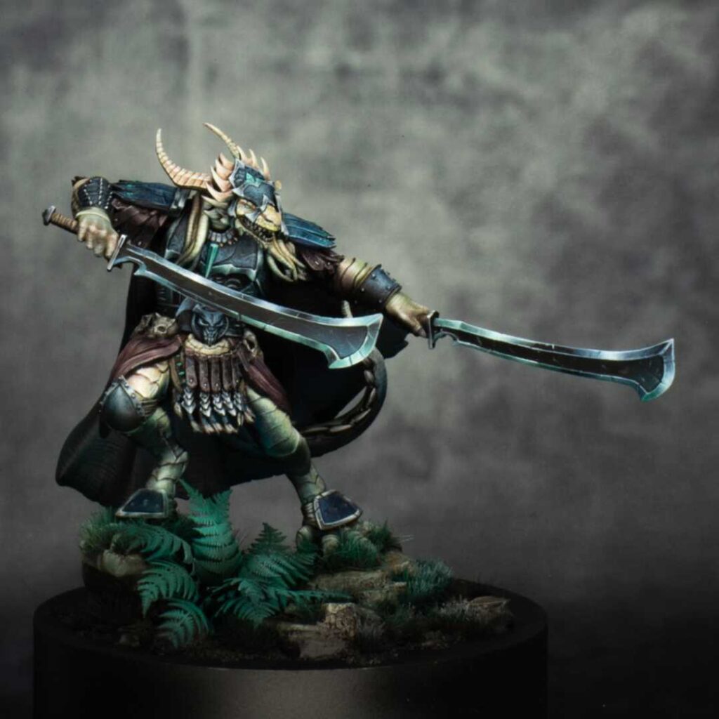A miniature from the Realms of Tiberium game, representing a anthropomorphic lizard wielding two swords, painted by Liam Hearne.