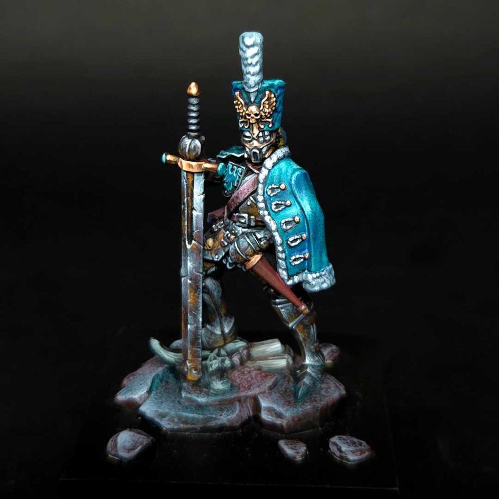 A Prussian Hauptmann miniature painted by Liam Hearne in a striking sky blue colour scheme.